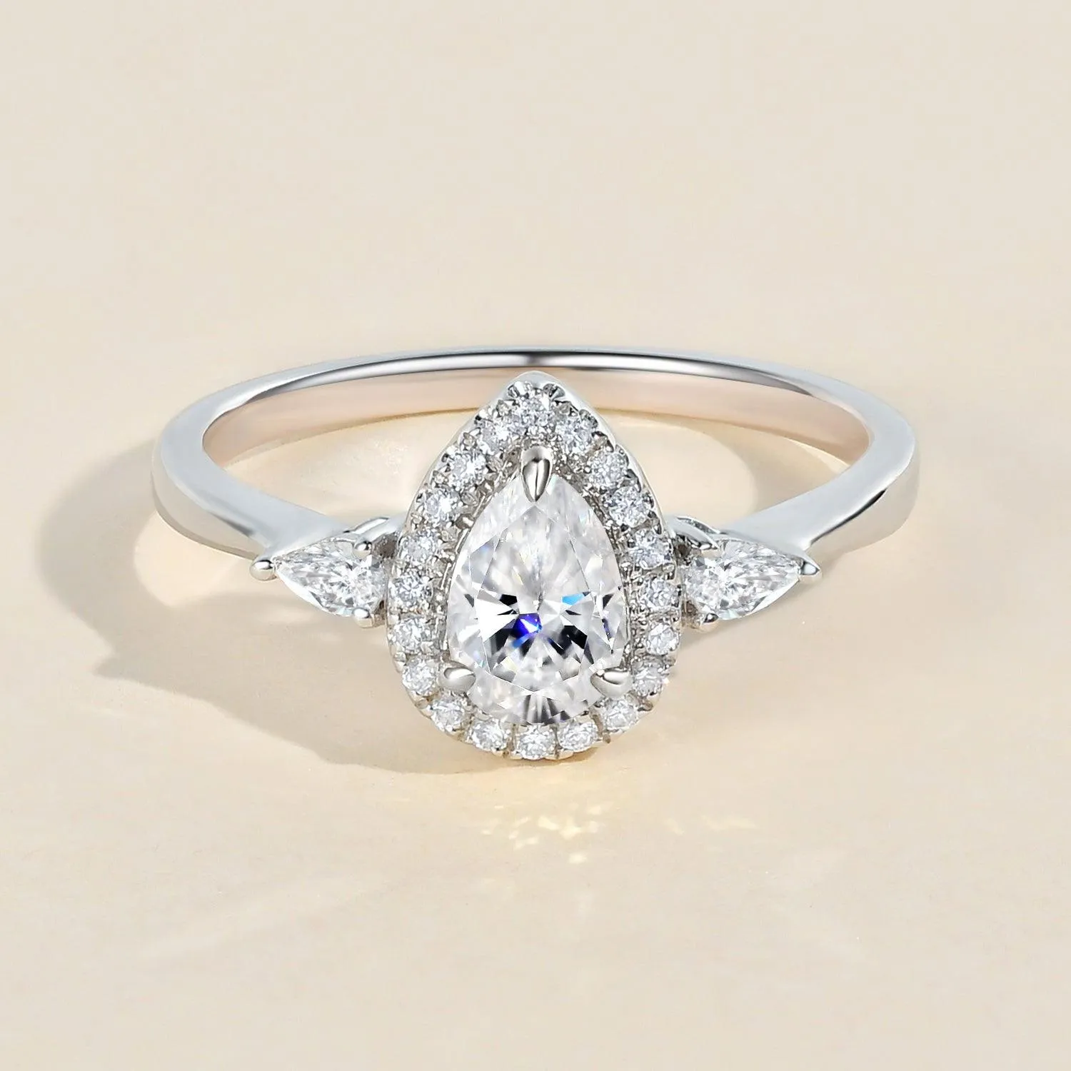 1.0ct Pear Shaped Moissanite Three-Stone Halo Ring