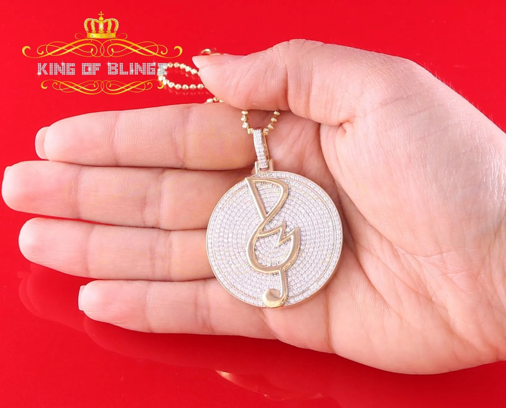 King Of Bling's Yellow 925 Sterling Silver Circle Music Sign Pendant with 3.74ct Cubic Zirconia